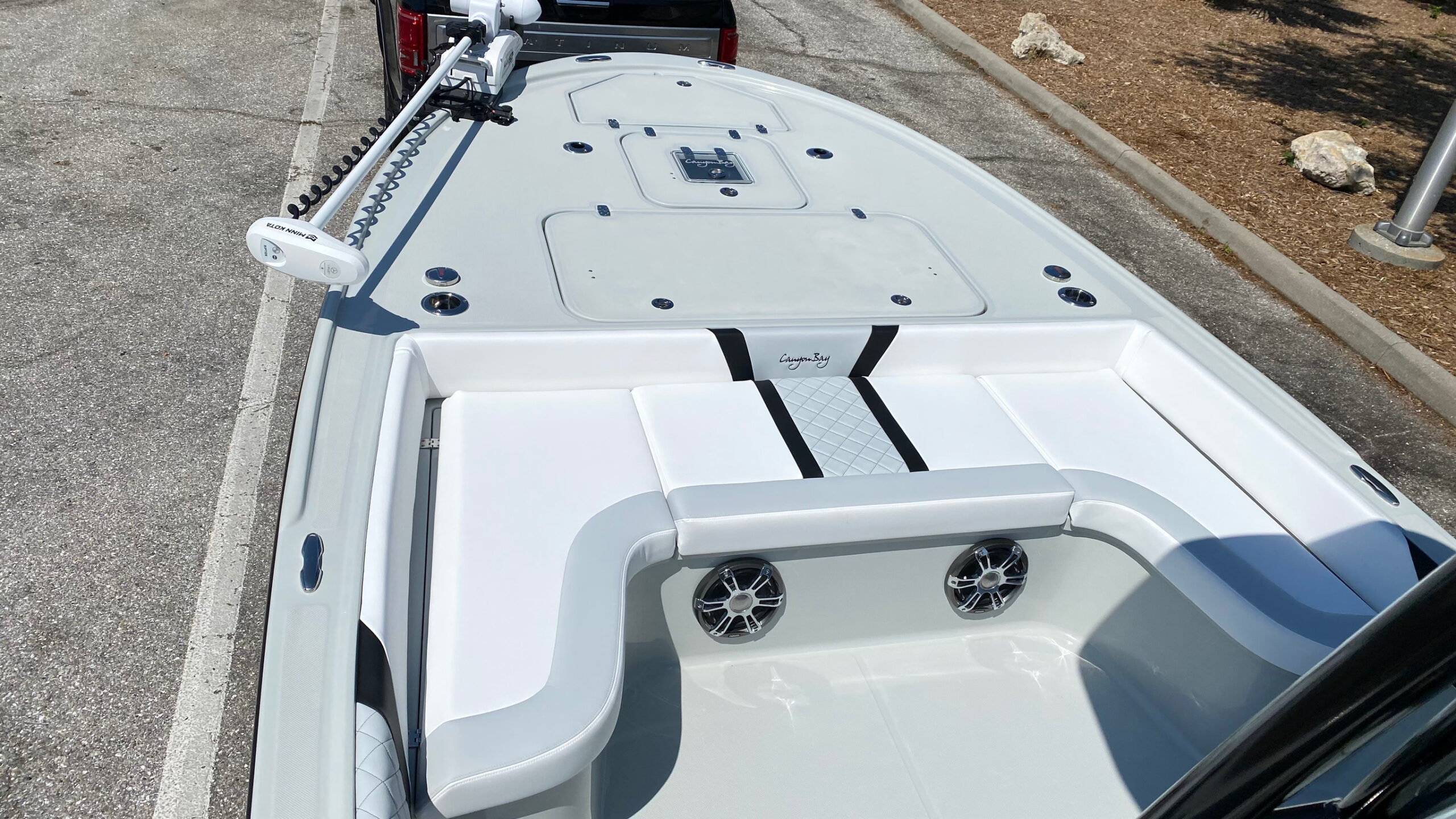 Canyon Bay 24h bow deck seating on trailer